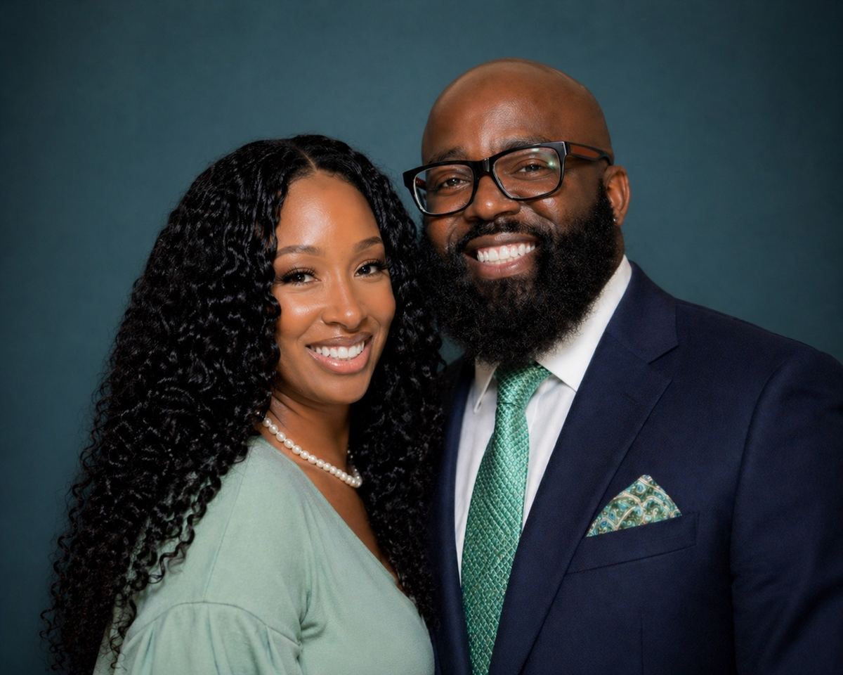 Pastor John and Lady Shar Reed smiling together